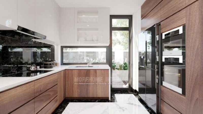 Không giống như ý tưởng trang trí phòng bếp biệt thự thông thường, bạn có thể tách rời tủ bếp mà vẫn đảm bảo công năng, thẩm mỹ, một bên tủ bếp phụ trách chức năng nấu nướng, bên còn lại để các đồ như tủ lạnh, lò vi sóng, lò nướng,… Thiết kế phòng bếp, tủ bếp đẹp