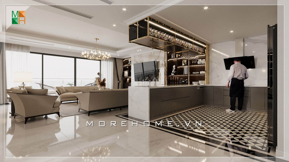 Ấn tượng với mẫu không gian phòng bếp rộng hiện đại, thiết kế bếp có dạng quầy bar đẹp mắt sáng tạo tiện lợi vừa có công dụng là kệ để đồ trang trí vừa có thể là nơi ngăn cách giữa bếp và phòng khách, kệ treo bếp còn là nơi trưng bày nhũng cái ly xinh xắn, những cái cốc thủy tinh lóng lánh. Thiết kế phòng bếp, tủ bếp đẹp