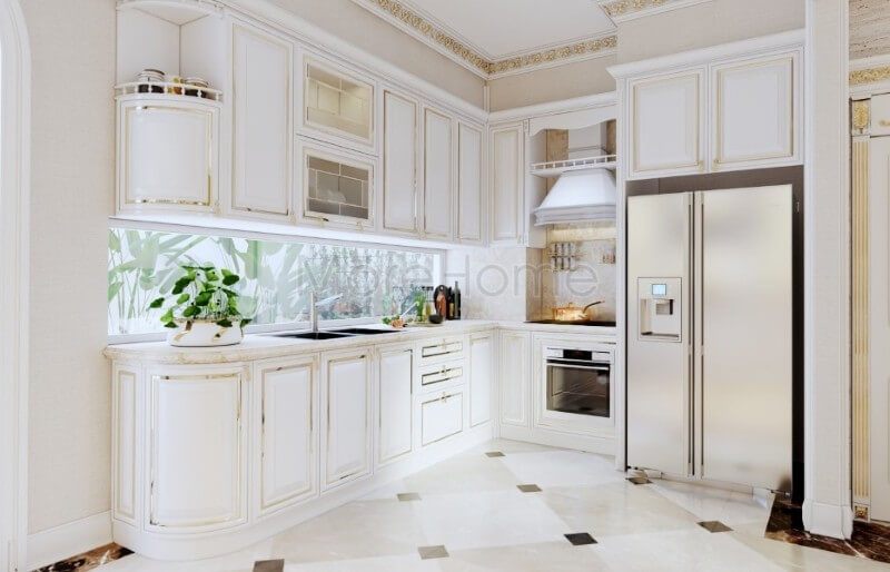 Thiết kế tủ bếp biệt thự kiểu dáng chữ L tân cổ điển đẹp mắt, từng chi tiết tinh tế trang trí đường ánh kim đơn giản tạo điểm nhấn đặc biệt giúp tăng thêm tính thẩm mỹ cho không gian nhà bếp