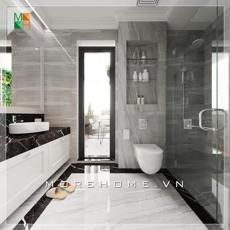 Một mẫu nhà vệ sinh cao cấp thiết kế hiện đại, kết hợp hai gam màu trắng và nâu đen. Tạo cho không gian nhà vệ sinh một sự tinh tế, sang trọng. Các vật dụng được sắp đặt, trang trí hài hòa và gọn gàng.