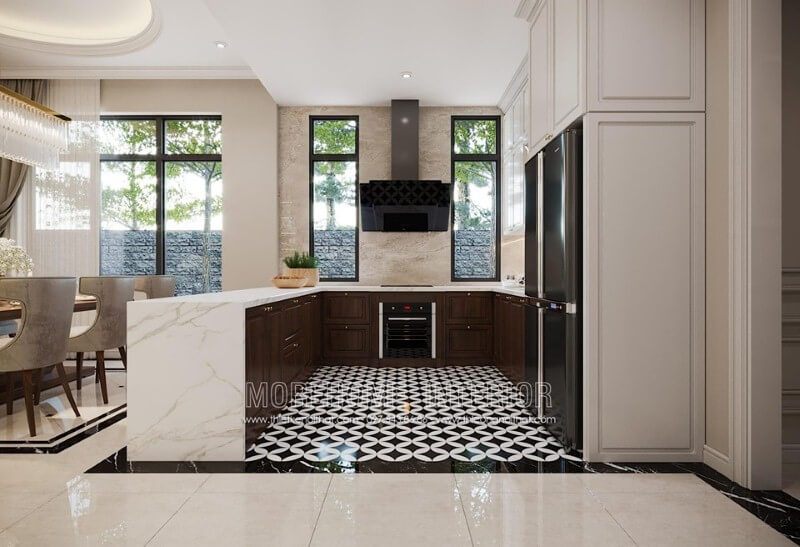 Cánh tủ bếp dưới gỗ óc chó tạo điểm nhấn sang trọng trong không gian bếp.