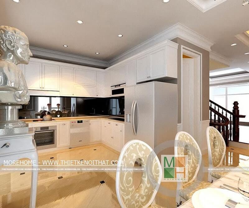 Mẫu tủ bếp gỗ màu trắng hình chữ L được trang bị đầy đủ các thiết bị bếp cao cấp tạo sự tiện nghi cho người nội trợ