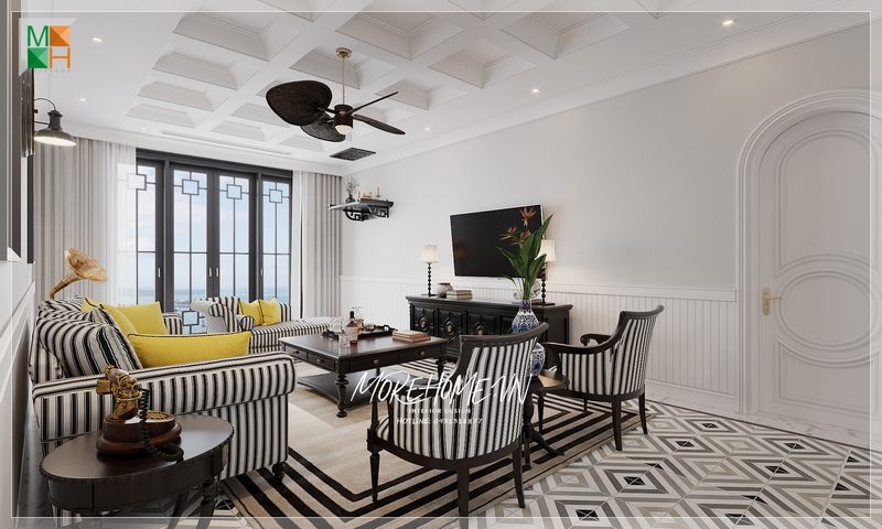 Gỗ tự nhiên được sơn màu đen và bọc nỉ Bỉ kẻ sọc để tạo nên hiệu ứng nổi bật trên không gian trắng của nội thất phòng khách.